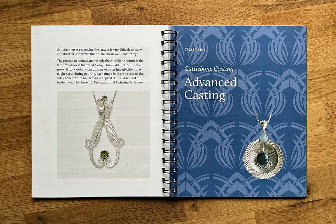 Spiral bound book titled Advanced Casting Techniques featuring an open page with text and images of castings.