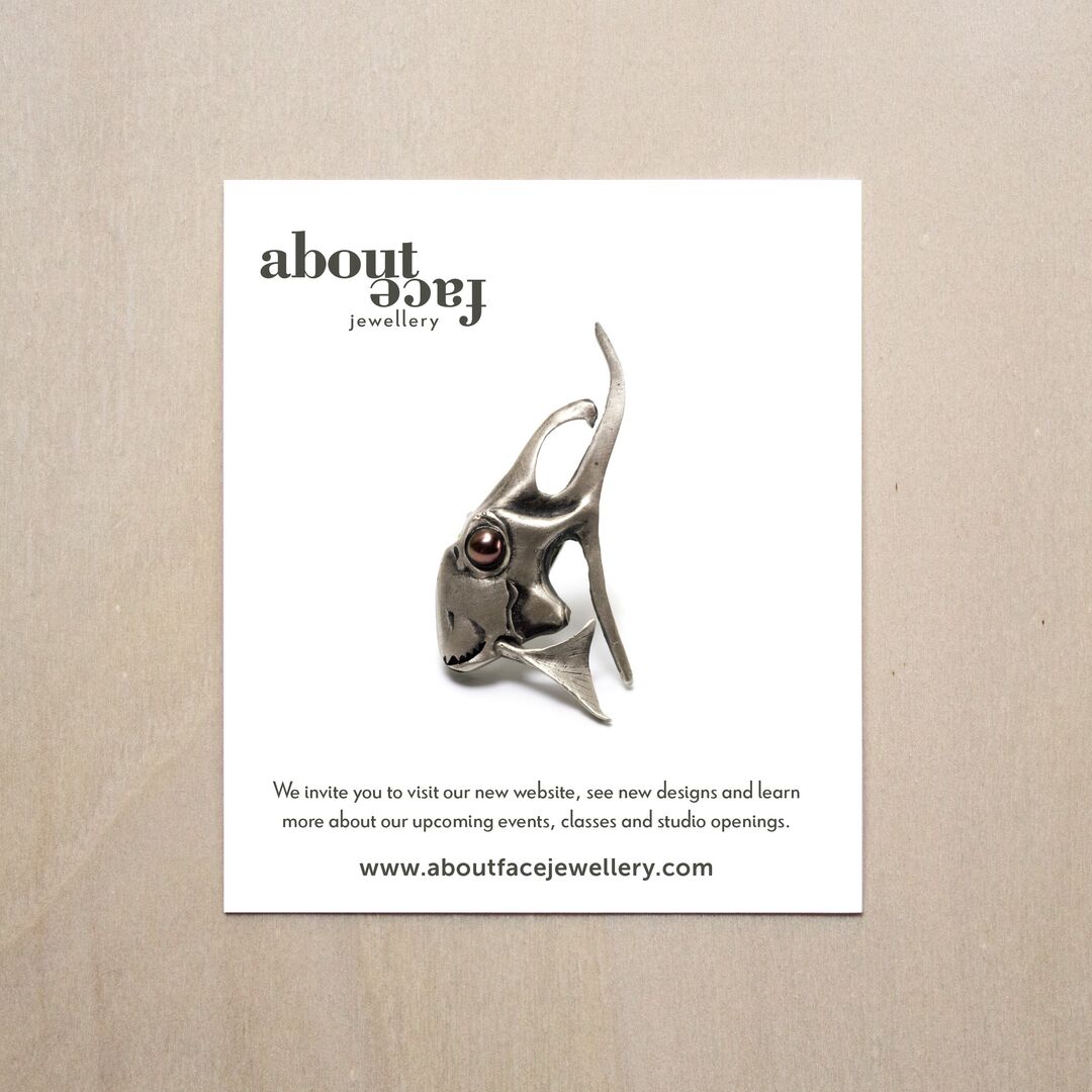 Aboutface Jewellery art card featuring beautiful brooch of a silver abstract fish